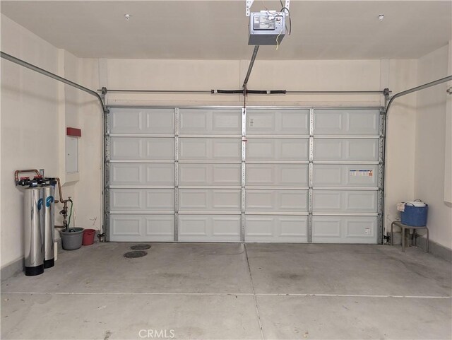 1582 Timberline, Beaumont, CA 92223 - garage featuring a garage door opener and electric panel