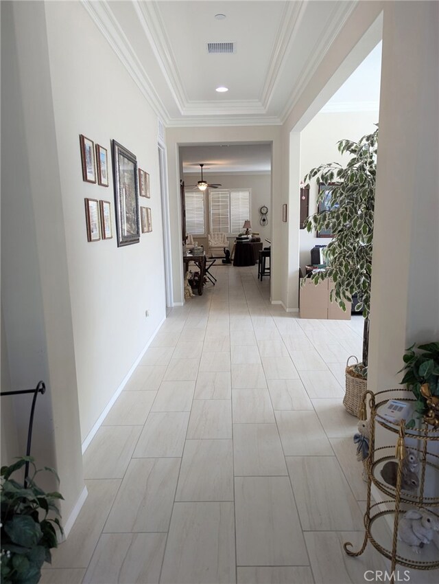 1582 Timberline, Beaumont, CA 92223 - corridor featuring a raised ceiling and crown molding