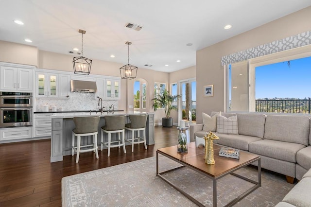 6281 Paseo Privado, Carlsbad, CA 92009 - living area featuring recessed lighting and dark wood-style floors