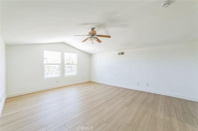 1172 Cedar Hollow Rd, Beaumont, CA 92223 - empty room with a ceiling fan, a smoke detector, lofted ceiling, and light wood finished floors