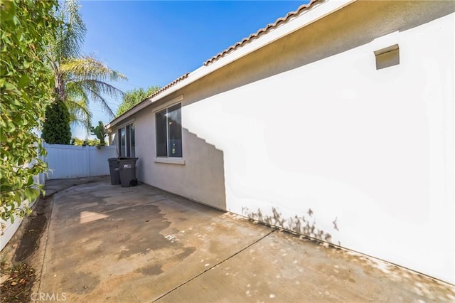 1172 Cedar Hollow Rd, Beaumont, CA 92223 - view of home's exterior featuring stucco siding and a patio area