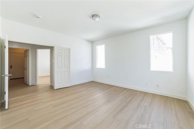 1172 Cedar Hollow Rd, Beaumont, CA 92223 - spare room with light wood-type flooring and a smoke detector