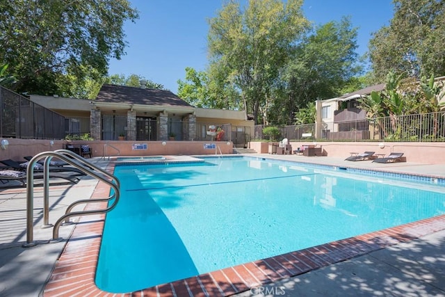 18350 Hatteras St Unit 169, Tarzana, CA 91356 - community pool featuring a hot tub and a patio
