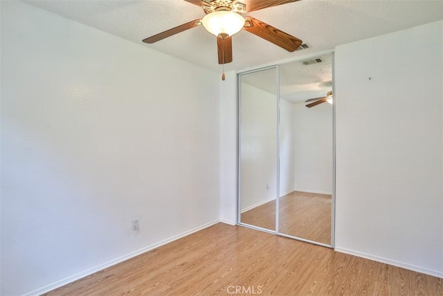 10249 Candlewood St, Rancho Cucamonga, CA 91730 - unfurnished bedroom featuring light wood-style flooring, a closet, baseboards, and ceiling fan
