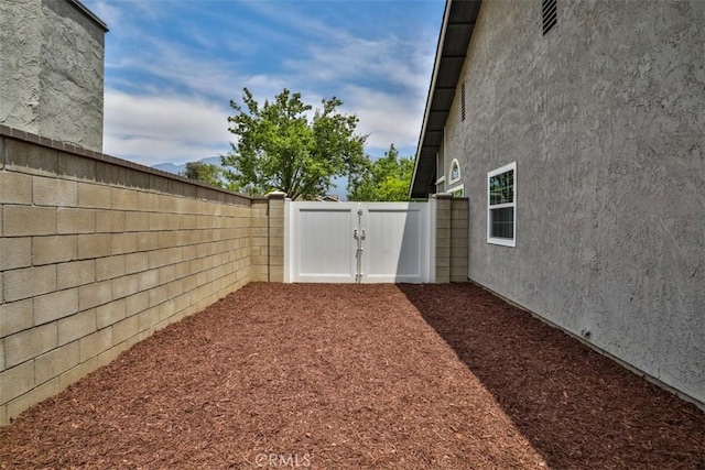 10249 Candlewood St, Rancho Cucamonga, CA 91730 - fenced backyard with a gate