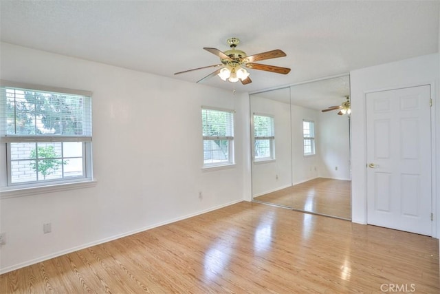 10249 Candlewood St, Rancho Cucamonga, CA 91730 - unfurnished room with ceiling fan, wood finished floors, and baseboards