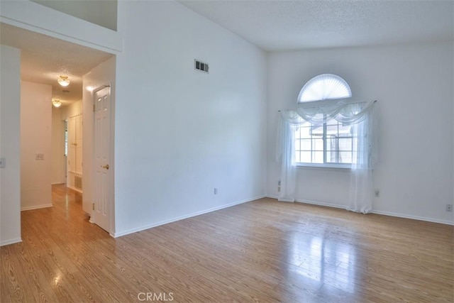 10249 Candlewood St, Rancho Cucamonga, CA 91730 - empty room with wood finished floors and baseboards