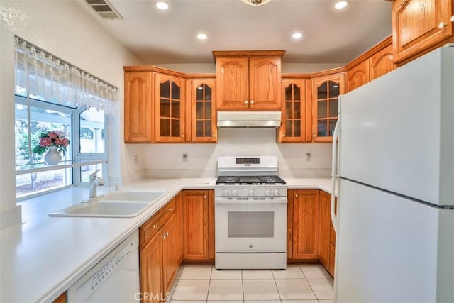 10249 Candlewood St, Rancho Cucamonga, CA 91730 - kitchen featuring white appliances, under cabinet range hood, a sink, light countertops, and recessed lighting