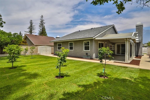10249 Candlewood St, Rancho Cucamonga, CA 91730 - rear view of house with stucco siding, a patio area, a chimney, and roof with shingles
