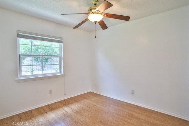 10249 Candlewood St, Rancho Cucamonga, CA 91730 - empty room featuring light wood finished floors, baseboards, ceiling fan, and a textured ceiling