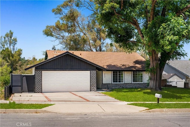3942 Willow Ln, Chino Hills, CA 91709 - single story home with an attached garage, driveway, a front lawn, brick siding, and roof with shingles