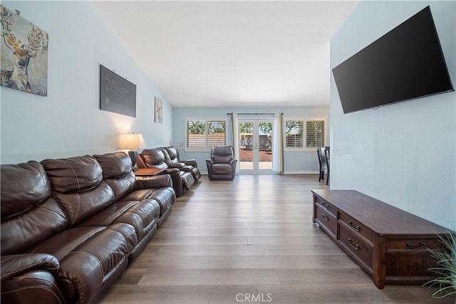 6597 Kinlock Ave, Rancho Cucamonga, CA 91737 - living area featuring wood finished floors and french doors