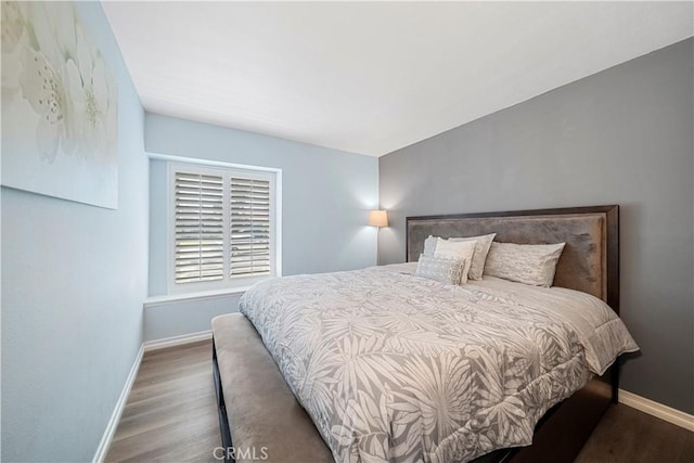 6597 Kinlock Ave, Rancho Cucamonga, CA 91737 - bedroom featuring baseboards and wood finished floors