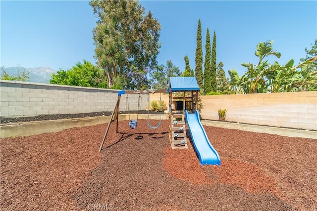 6597 Kinlock Ave, Rancho Cucamonga, CA 91737 - view of playground featuring a fenced backyard and a mountain view