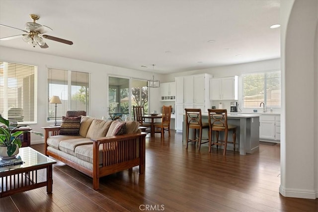 1467 Hunter Moon Way, Beaumont, CA 92223 - living area with ceiling fan, dark wood-style floors, baseboards, and recessed lighting