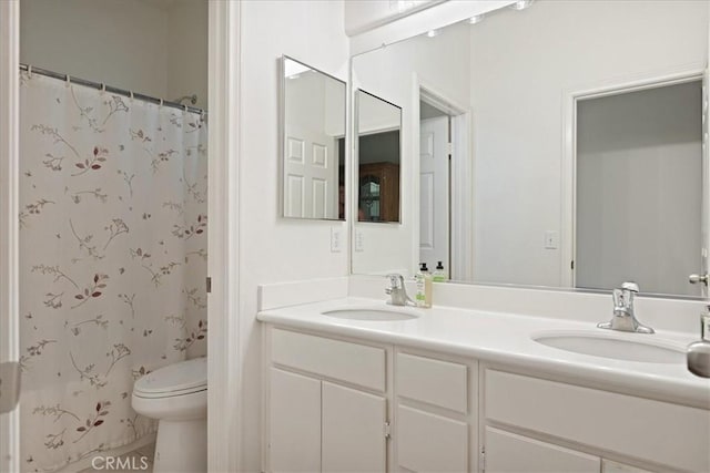 1467 Hunter Moon Way, Beaumont, CA 92223 - bathroom with double vanity, toilet, and a shower with curtain