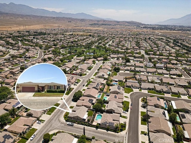 1467 Hunter Moon Way, Beaumont, CA 92223 - aerial perspective of suburban area featuring a mountainous background