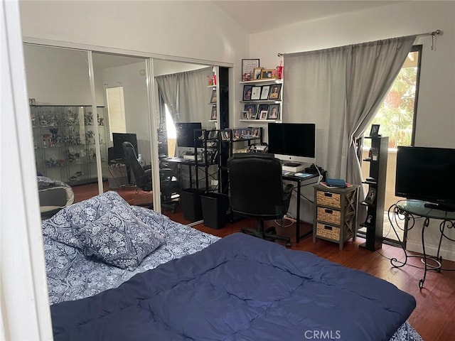 404 Brighton Spgs, Costa Mesa, CA 92627 - bedroom featuring lofted ceiling, a closet, an office area, and wood finished floors
