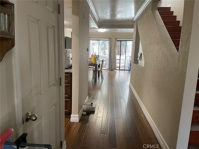 404 Brighton Spgs, Costa Mesa, CA 92627 - corridor with ornamental molding, dark wood-style floors, a textured wall, and baseboards