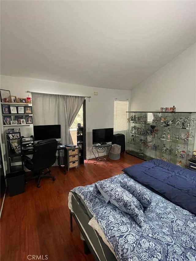 404 Brighton Spgs, Costa Mesa, CA 92627 - bedroom featuring wood finished floors, a desk, and lofted ceiling