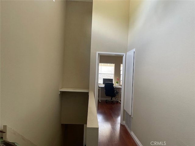 404 Brighton Spgs, Costa Mesa, CA 92627 - hallway with an office area and dark wood-style flooring