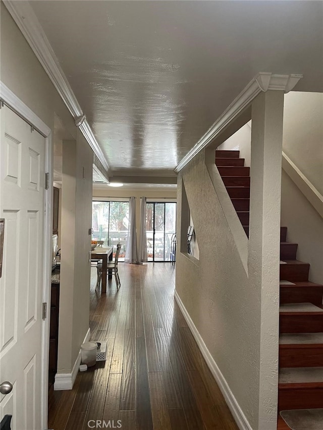 404 Brighton Spgs, Costa Mesa, CA 92627 - hall featuring ornamental molding, stairs, dark wood-type flooring, and baseboards