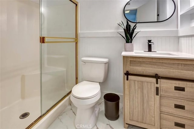 32457 Spyglass Ct, San Juan Capistrano, CA 92675 - bathroom featuring marble look tile flooring, vanity, toilet, and a shower stall