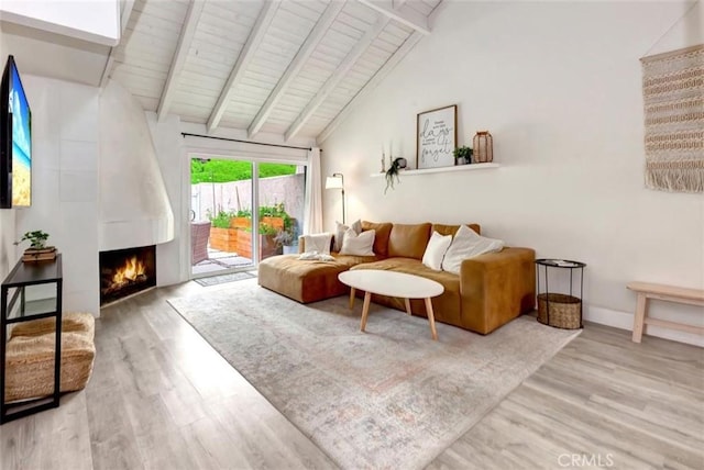 32457 Spyglass Ct, San Juan Capistrano, CA 92675 - living room with wood finished floors, a large fireplace, wooden ceiling with exposed beams, and high vaulted ceiling