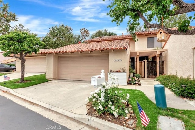 32457 Spyglass Ct, San Juan Capistrano, CA 92675 - mediterranean / spanish-style house featuring an attached garage, driveway, stucco siding, and a tiled roof