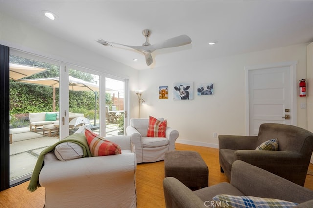 6017 Carnegie St, San Diego, CA 92122 - living area with light wood-type flooring, recessed lighting, ceiling fan, and baseboards