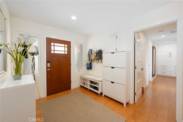6017 Carnegie St, San Diego, CA 92122 - entrance foyer with light wood-type flooring, recessed lighting, and baseboards