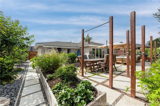 6017 Carnegie St, San Diego, CA 92122 - back of property featuring a patio area and stucco siding