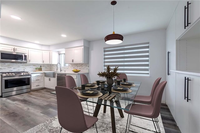 9000 Vanalden Ave Unit 176, Northridge, CA 91324 - dining room featuring wood finished floors and recessed lighting