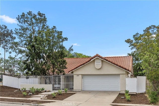 1348 Sandia St, Corona, CA 92882 - view of front of house featuring stucco siding, driveway, a tile roof, and a garage