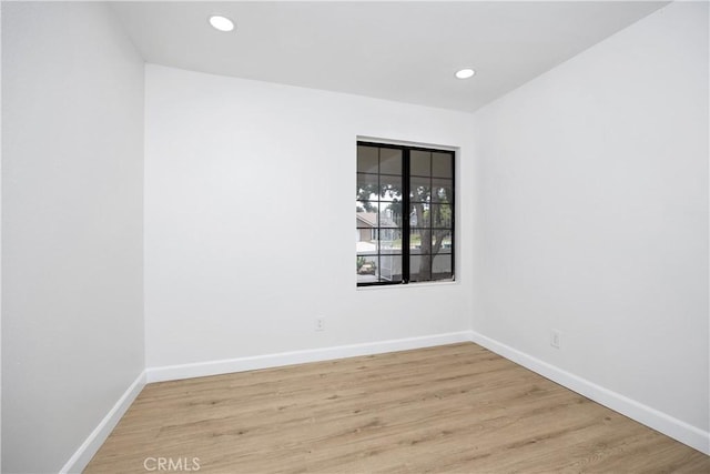 1348 Sandia St, Corona, CA 92882 - empty room with wood finished floors, baseboards, and recessed lighting