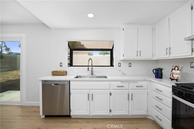 1348 Sandia St, Corona, CA 92882 - kitchen with dishwasher, a sink, range with gas stovetop, white cabinetry, and light countertops