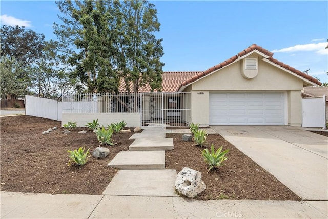 1348 Sandia St, Corona, CA 92882 - view of front of property featuring stucco siding, concrete driveway, a tiled roof, and an attached garage