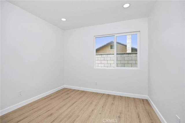 1348 Sandia St, Corona, CA 92882 - unfurnished room featuring wood finished floors, baseboards, and recessed lighting