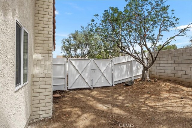 1348 Sandia St, Corona, CA 92882 - view of yard with a gate