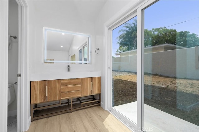 1348 Sandia St, Corona, CA 92882 - bathroom featuring vanity, wood finished floors, toilet, and recessed lighting