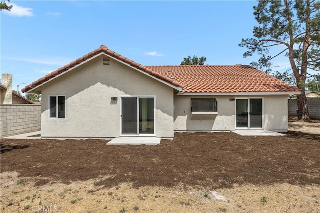 1348 Sandia St, Corona, CA 92882 - back of property with stucco siding and a tiled roof