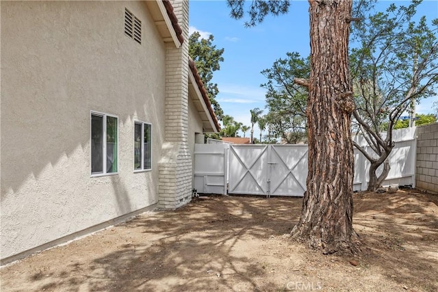 1348 Sandia St, Corona, CA 92882 - view of yard featuring a gate