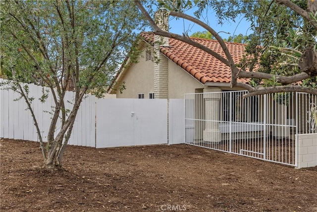 1348 Sandia St, Corona, CA 92882 - view of yard with a gate