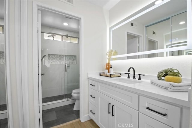 921 Boon Pl Unit A, Corona, CA 92881 - bathroom with toilet, a shower stall, vanity, and wood finished floors