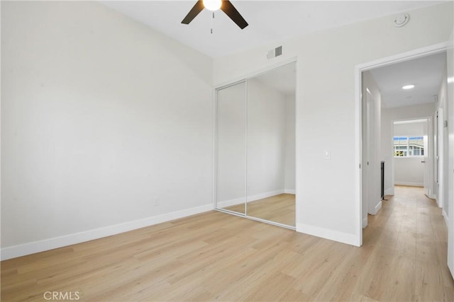 921 Boon Pl Unit A, Corona, CA 92881 - unfurnished bedroom featuring light wood-type flooring, a closet, and baseboards