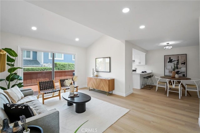 921 Boon Pl Unit A, Corona, CA 92881 - living room with light wood-style floors, baseboards, lofted ceiling, and recessed lighting