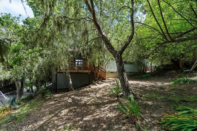 645 Worcester Dr, Cambria, CA 93428 - view of yard with a deck and stairway