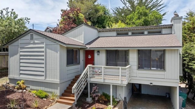 645 Worcester Dr, Cambria, CA 93428 - view of front of property featuring a shingled roof, a chimney, a deck, and stairs
