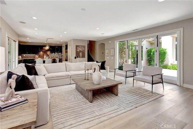 29310 Paseo Palmar, San Juan Capistrano, CA 92675 - living room with recessed lighting, arched walkways, and light wood-style floors