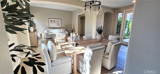 29310 Paseo Palmar, San Juan Capistrano, CA 92675 - dining room featuring arched walkways and wood finished floors
